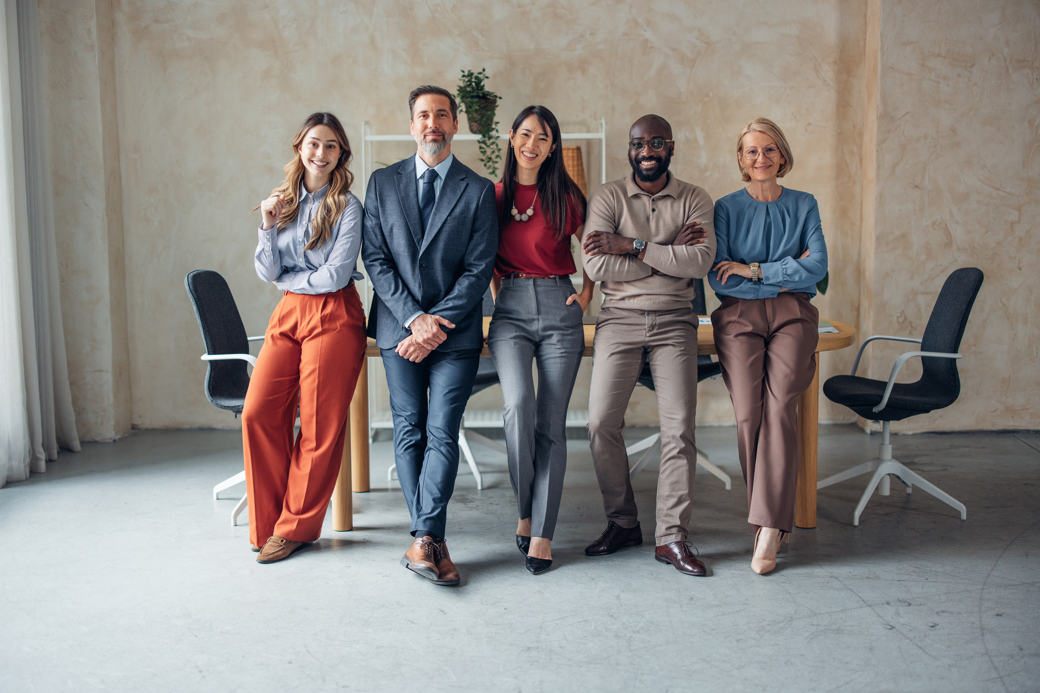 Pauls Collective leadership team posing in an office